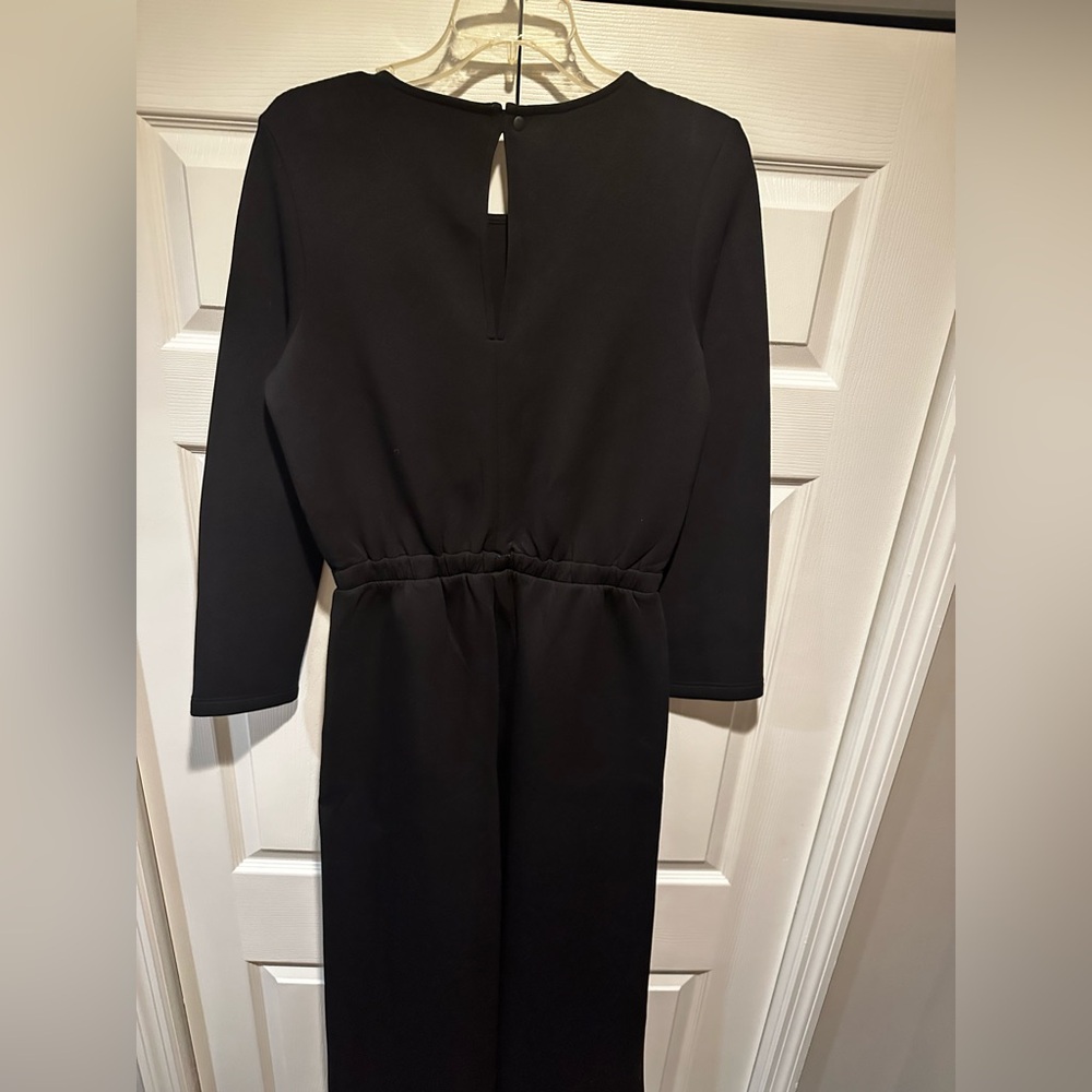 Leze the Label black jumpsuit. Never been worn before, fit too big so selling.